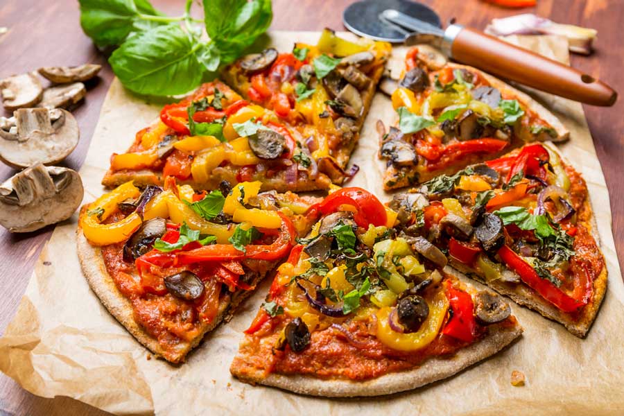 View of a whole vegan pizza in Picazzo’s Healthy Italian Kitchen