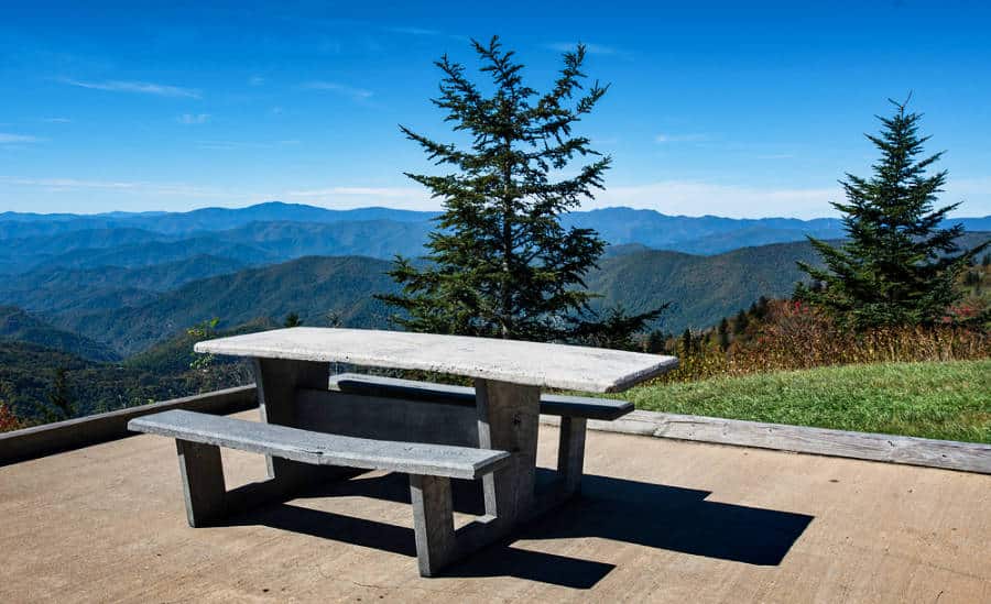A picnic table with a scenic overlooking view from Blue Ridge Parkway