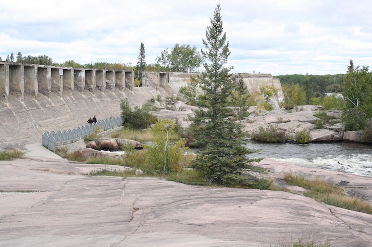 Water rushes through the Pinawa Dam in Manitoba