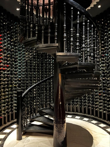 A staircase at the wine cellar in Pink Pearl
