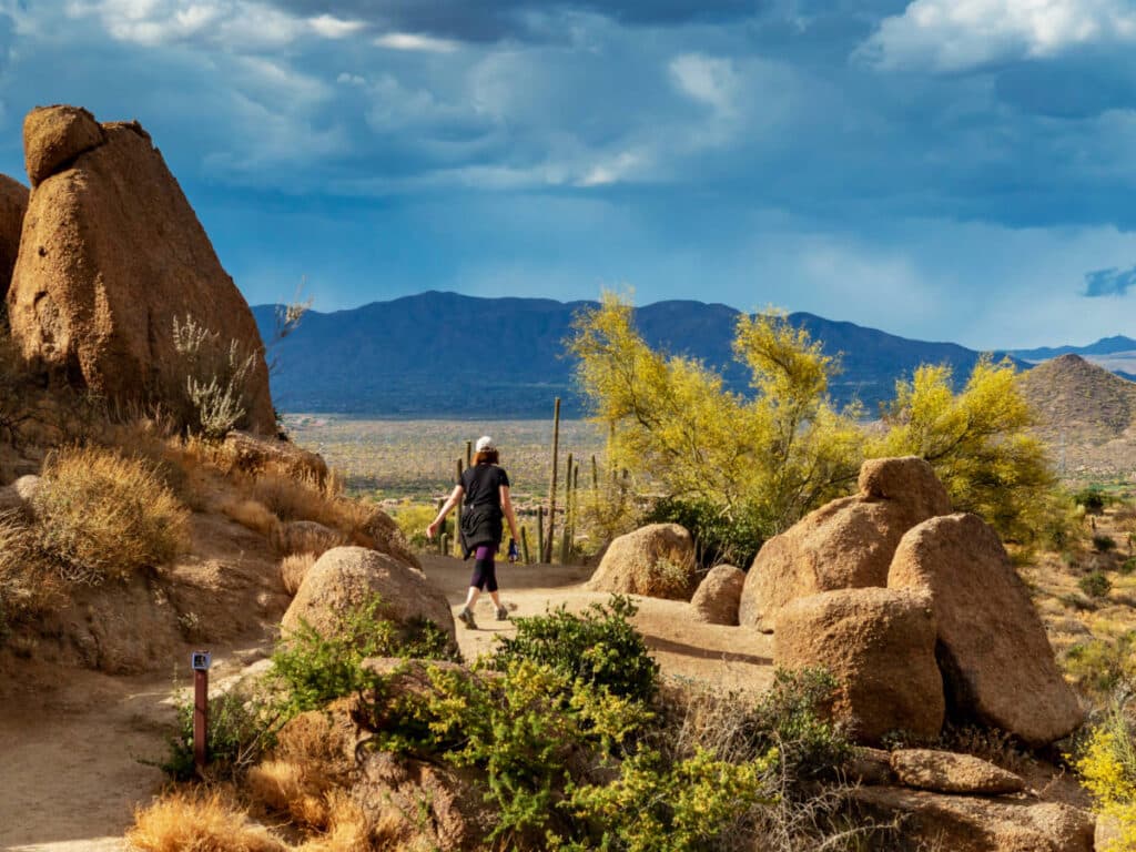 A woman wandering at the Pinnacle Peak Trail