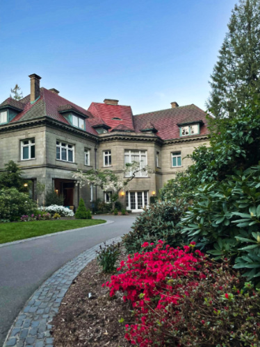 Exterior view of the French style Pittock Mansion, seen from the driveway