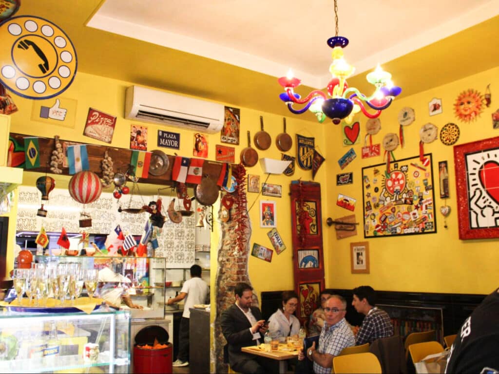 View of the colorful interior of the little Piz pizzeria in Milan