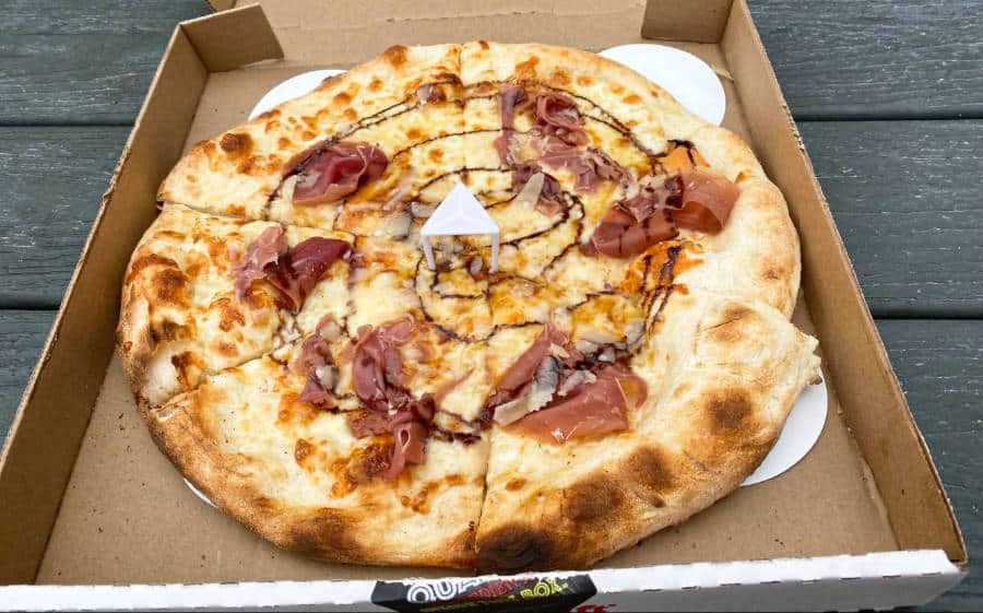 Cal Italia pizza topped with prosciutto, sweet fig, and a balsamic reduction of Pizza Rock