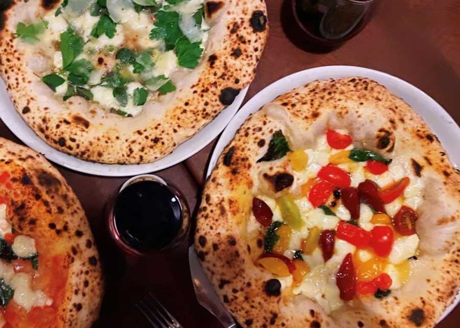 View of different pizza flavor on a table