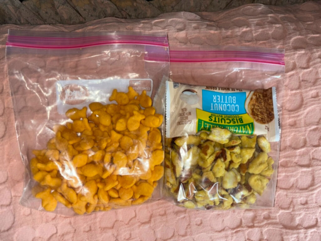 Two plastic of Snacks for a flight