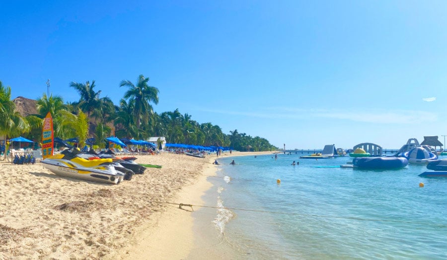 View of giant inflatables and jet ski in Playa Mia Grand Beach Park