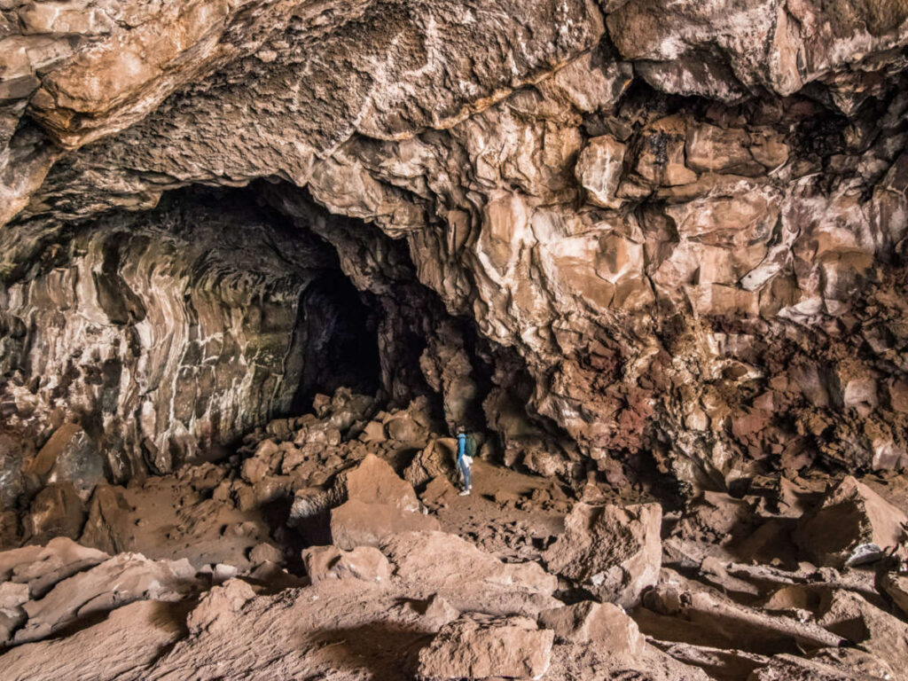 A hiker inside the Pluto’s Cave