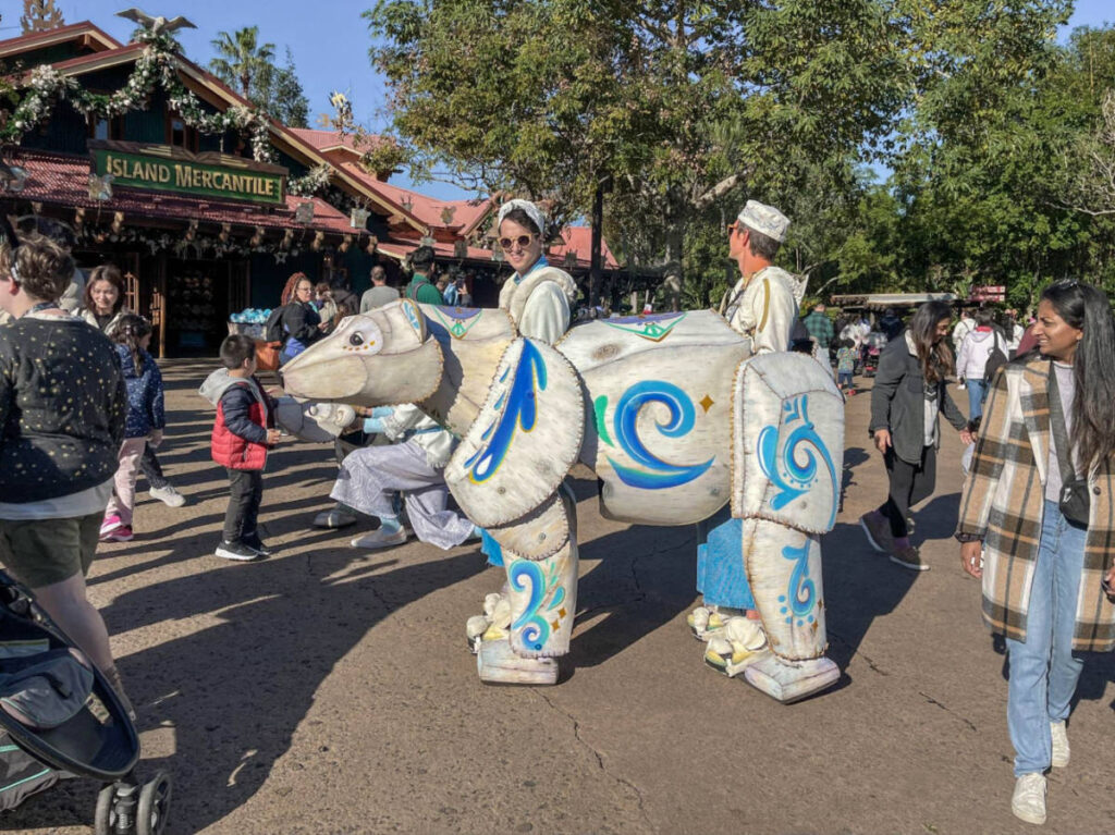 Two person in a Polar bear costume near Island Mercantile