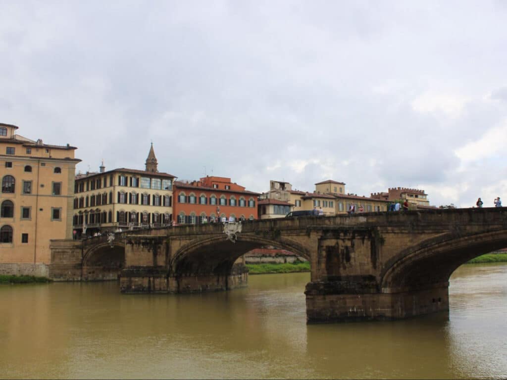 View of the Ponte Vecchio leading to the Oltrarno neighborhood on a gloomy day
