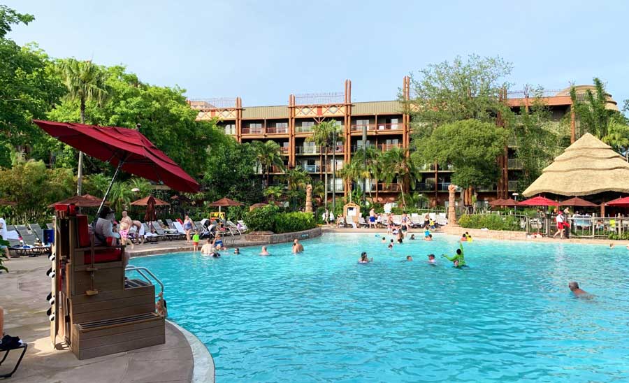 People enjoying their day in a pool in Animal Kingdom Lodge