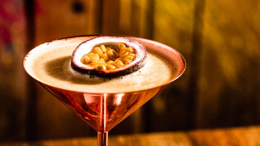 A glass of copper martini with the pornstar martini cocktail