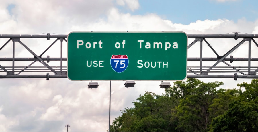 A traffic exit sign above the highway of Port Tampa City