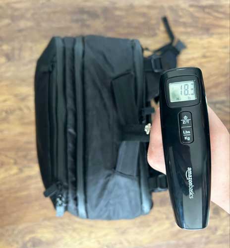 Weighing the Tortuga Travel Backpack using a Portable Digital Weight Scale