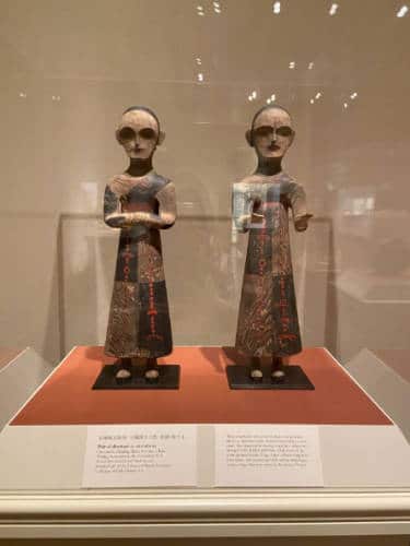A pair of figurines at the Portland Art Museum