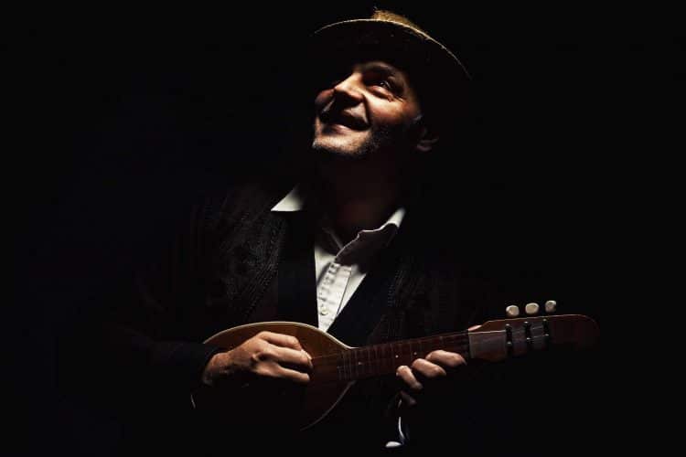Portrait of a Musician playing Tamburitza