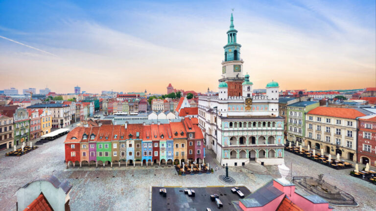 Scenic cityscape of Poznan Old Town featuring charming European buildings at sunset
