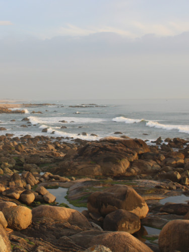 The rocky shoreline of Praia de Lavadores