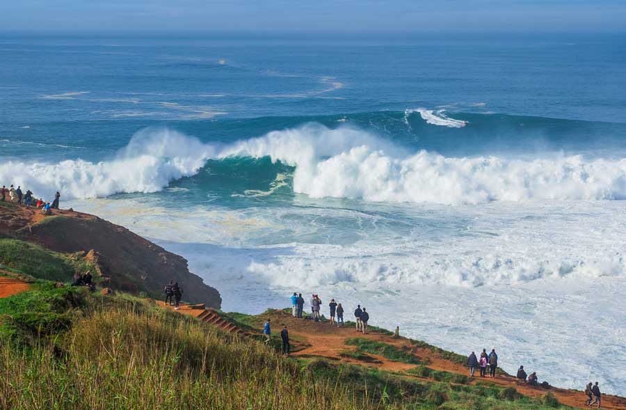 View of foamy waves at the Praia do Norte