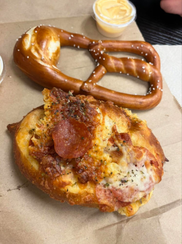 A pepperoni and mozzarella pretzel & a salted pretzel from FatBelly Pretzel