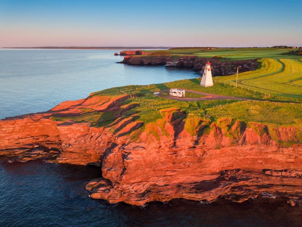 Aerial view of the cliffside of Prince Edward Island at sunset