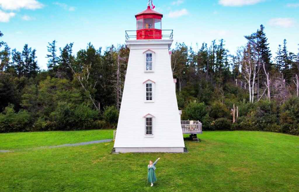 Travel Lemming Editor Taylor in one of the lighthouse in Prince Edward Island