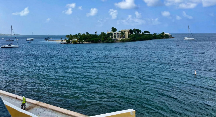 View of the serene ocean and boats around Protestant Cay from Fort Christiansvaern