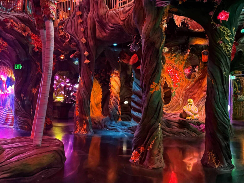 View of a sitting psychedelic sloth