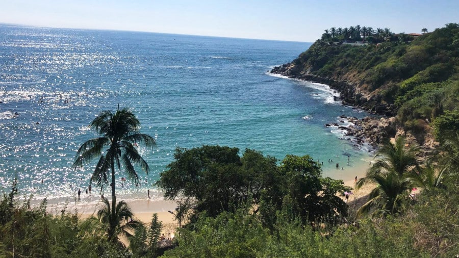 Aerial view of the stunning Playa Carrizalillo beach and the lush green island