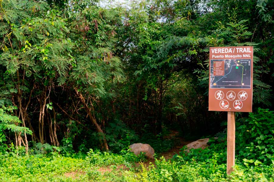 View of a signage along the hiking trail in Puerto Mosquito NNL