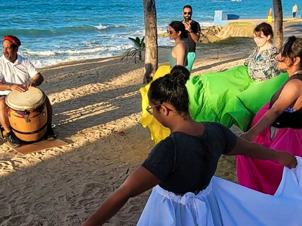 People at the Folklore Bomba Class at the beach