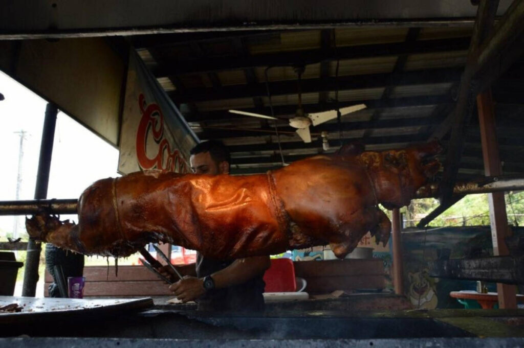A man cooking the Lechon