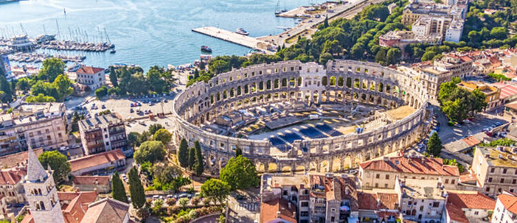Aerial view of the Pula Arena near the marina