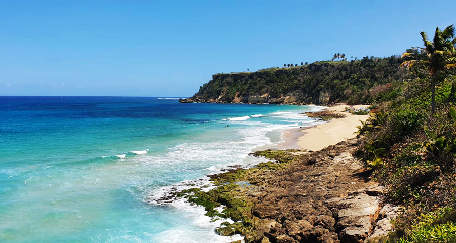 Scenic view of the blue water and clear blue sky in Punta Borinquen Beach