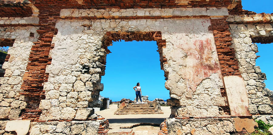 The author posing for a picture in Punta Borinquen Lighthouse Ruins