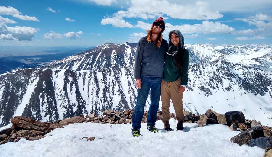 Travel Lemming Editor Abigail with her husband at the top of Quandary Peak