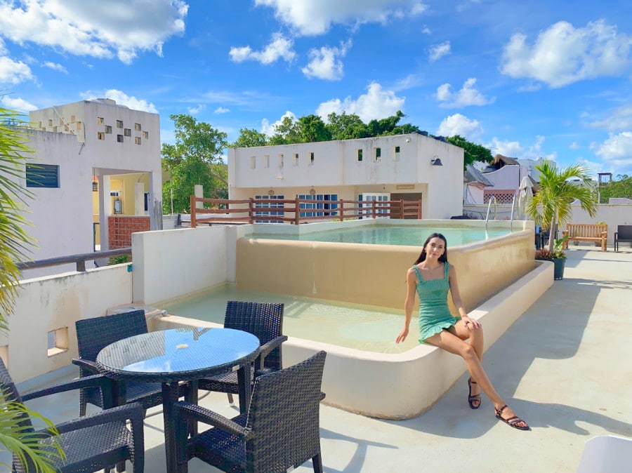 Clara sitting near the pool in Quinta Margarita
