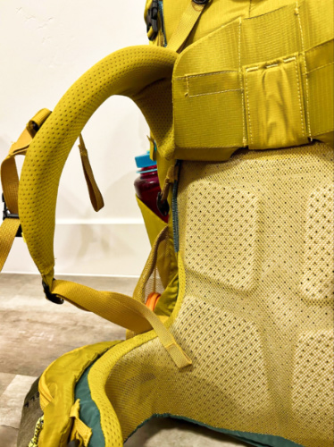 Closeup look at the padded hip belt, shoulder straps, and ventilated back panel of the REI Co-Op Flash 55 Backpack
