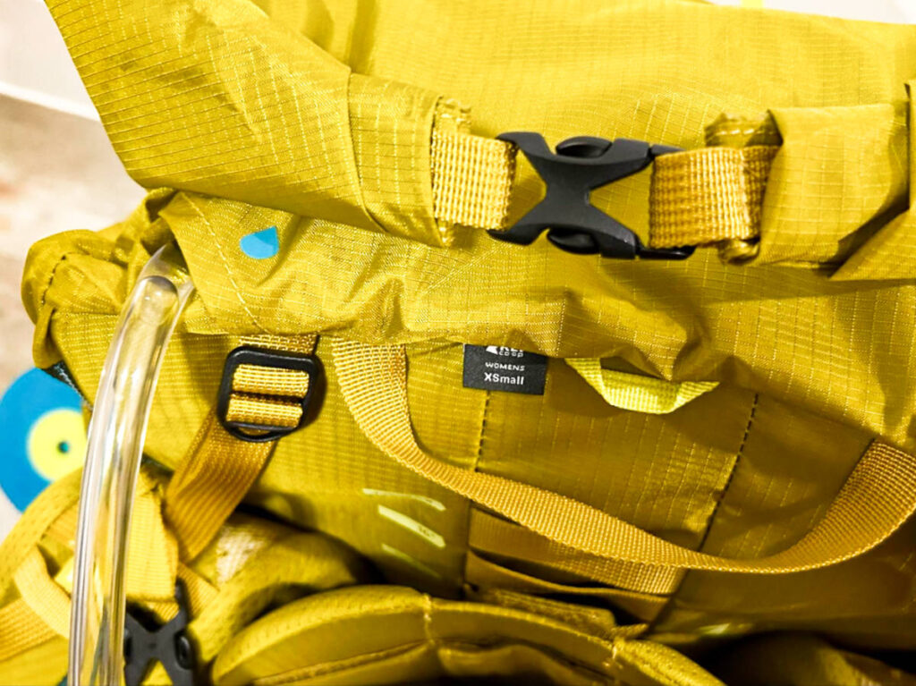 View of the straps and hydration port of Pocket Inside REI Co-Op Flash 55 Backpack