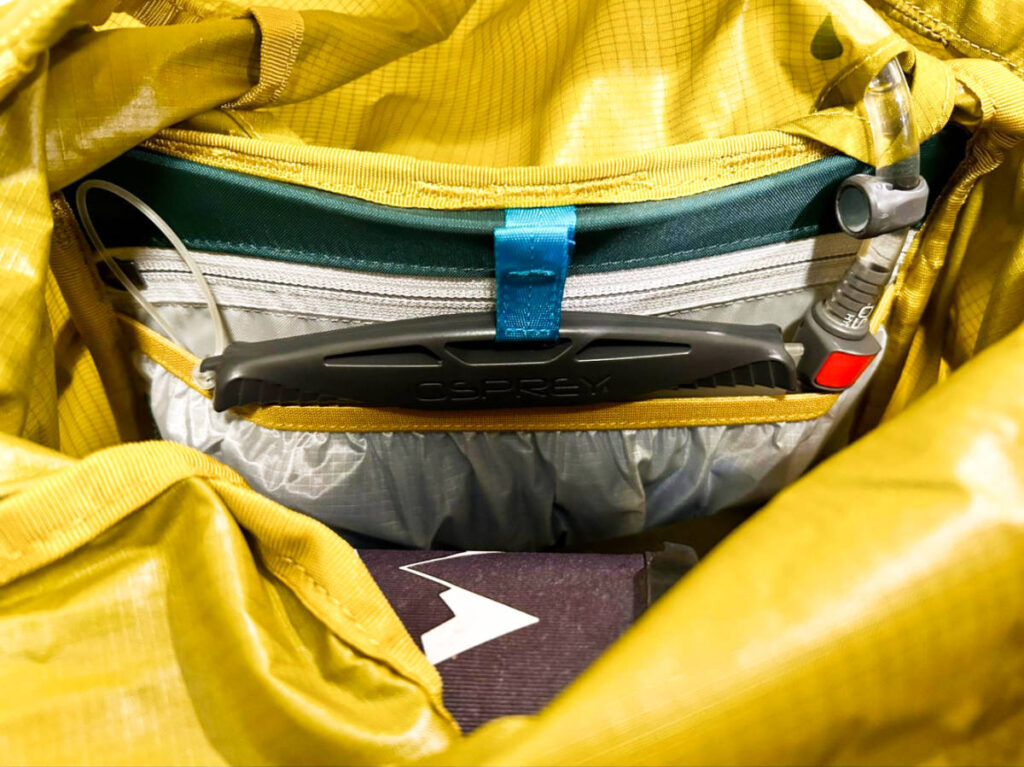 View of the additional pocket inside the REI Co-Op Flash 55 Backpack
