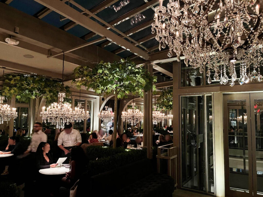 People enjoying their night inside the RH Rooftop Restaurant