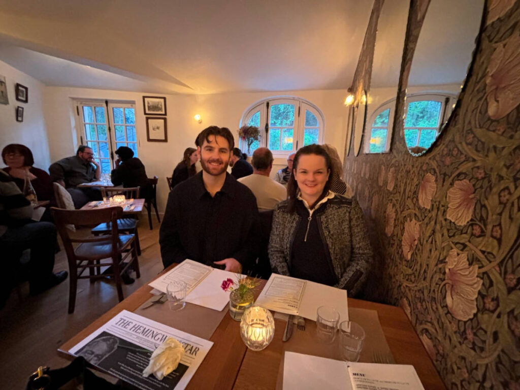 The author Rachel Kapelke-Dale dining at a restaurant with a friend