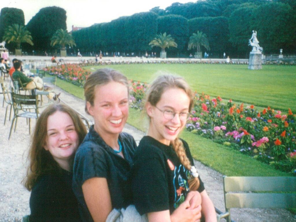 The author Rachel and her sisters enjoying at the Luxembourg Gardens in 1999