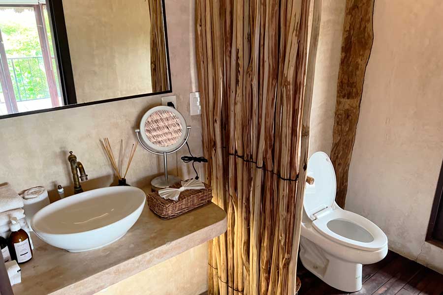View inside the bathroom of a room in Radhoo Tulum