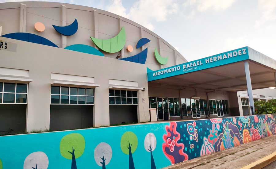 Colorful wall art outside the Rafael Hernández Airport in Aguadilla