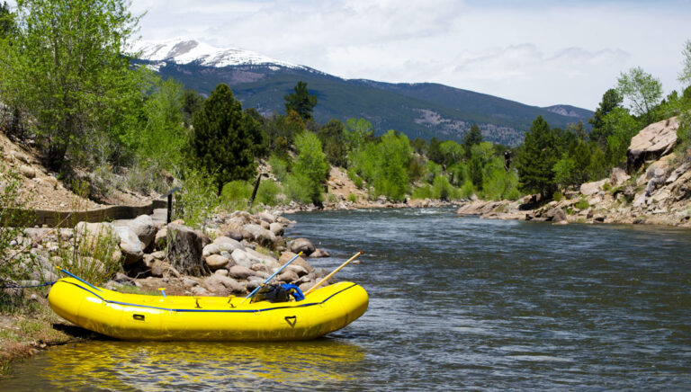 View of a yellow river raft on the Arkansas River