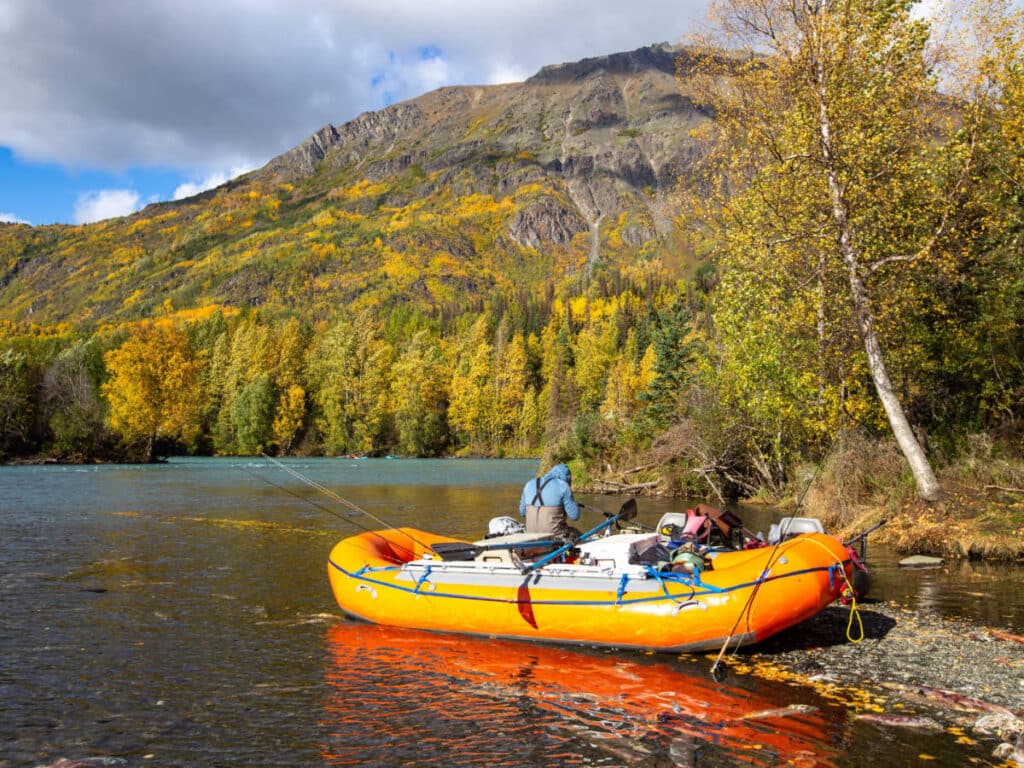 A raft on the Kenai River during early autumn