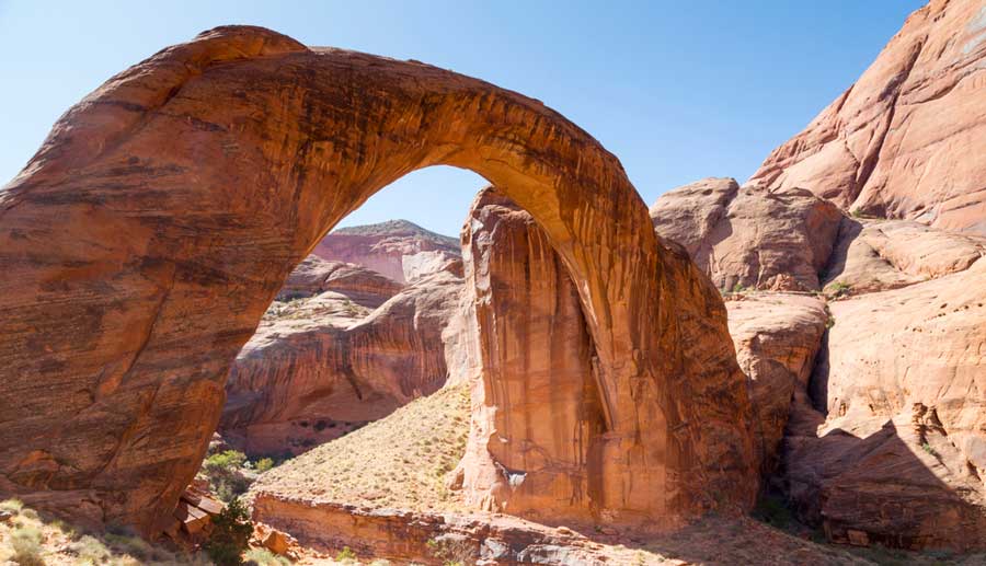 The Rainbow Bridge National Monument under the clear blue sky in Utah