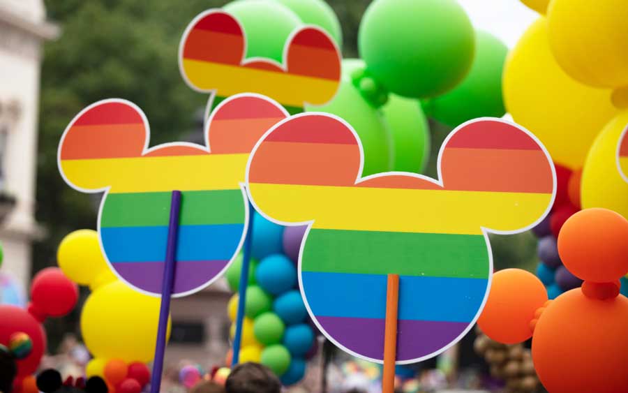 A rainbow colored Mickey Mouse ears
