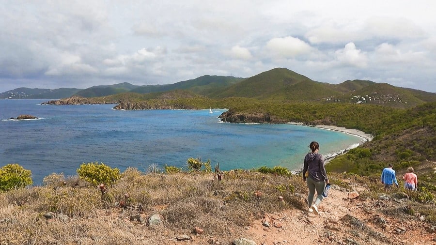 View of people hiking at the Ram Head Trail with overlooking view of the beach